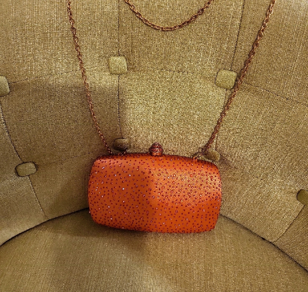 Vibrant Orange Textured Clutch with Chain Strap